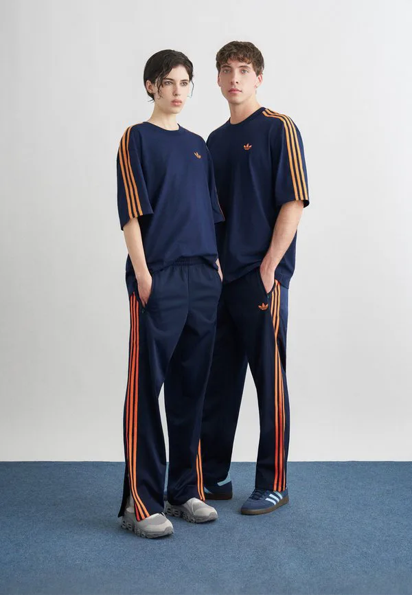 Спортивные штаны firebird Adidas Originals, Night Indigo/Lucid Orange — фото 2