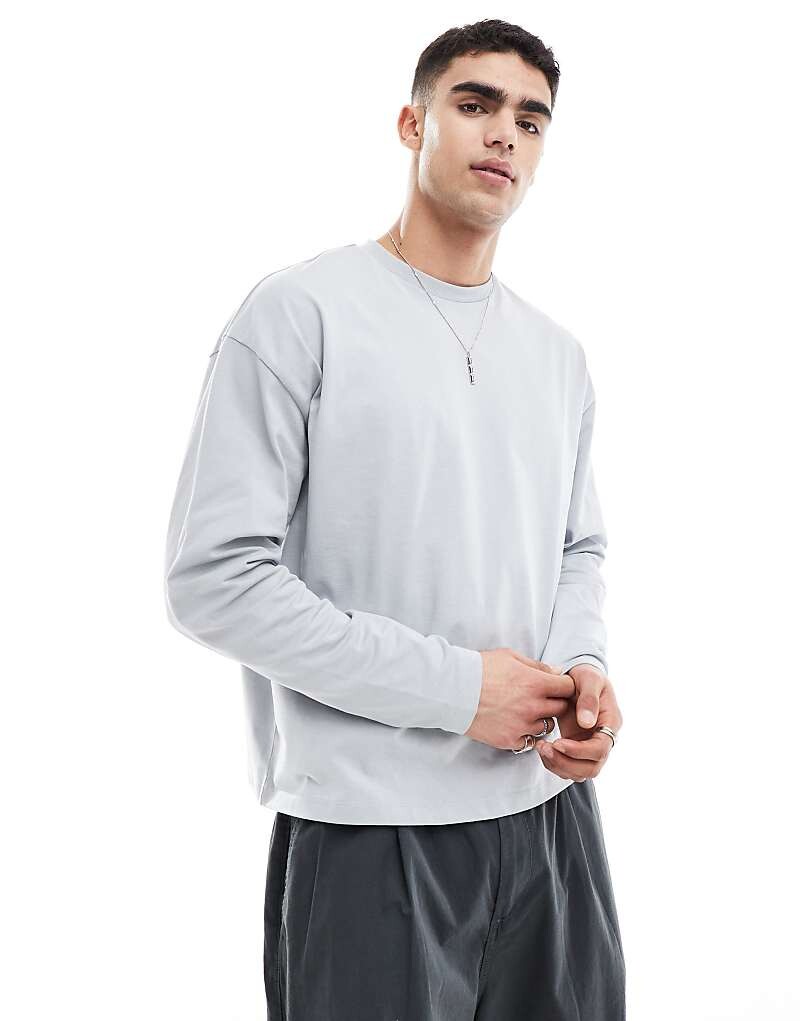 

Светло-серая объемная футболка свободного кроя с длинными рукавами ASOS DESIGN Essential плотностью 240 г/м²