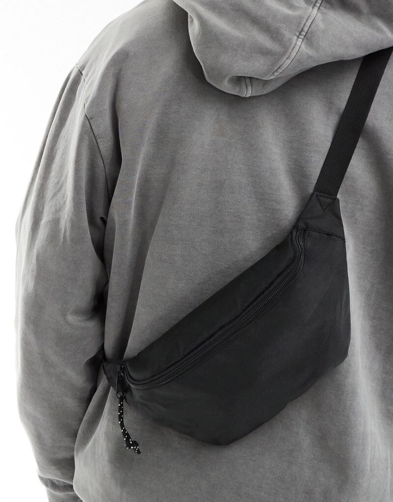

Черная поясная сумка через плечо с контрастными язычками ASOS DESIGN