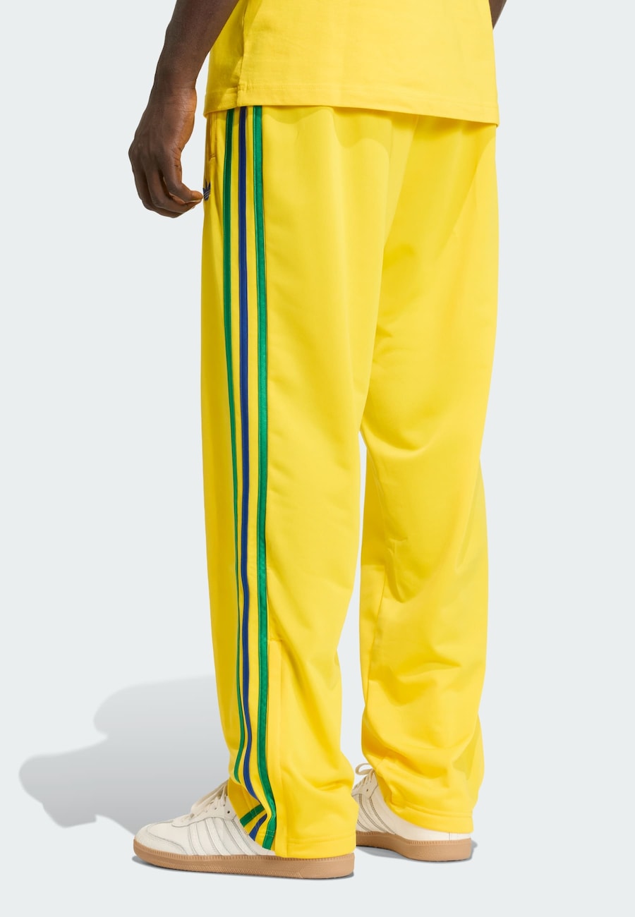 Брюки свободного кроя ADIDAS ORIGINALS Firebird, желтый — фото 3