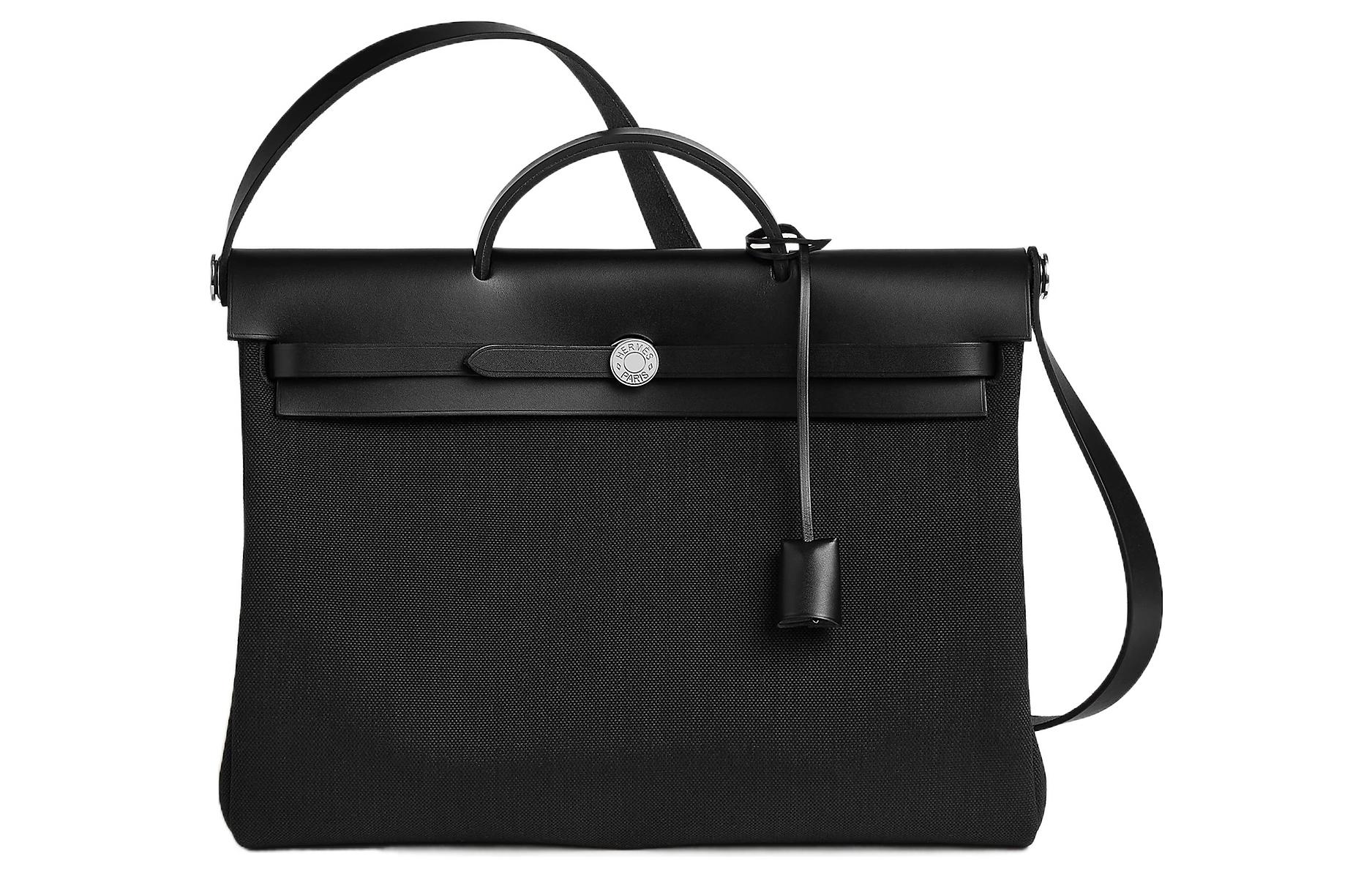 

Сумка-мессенджер Herbag из холста с кожей коровы Hunter черная HERMES