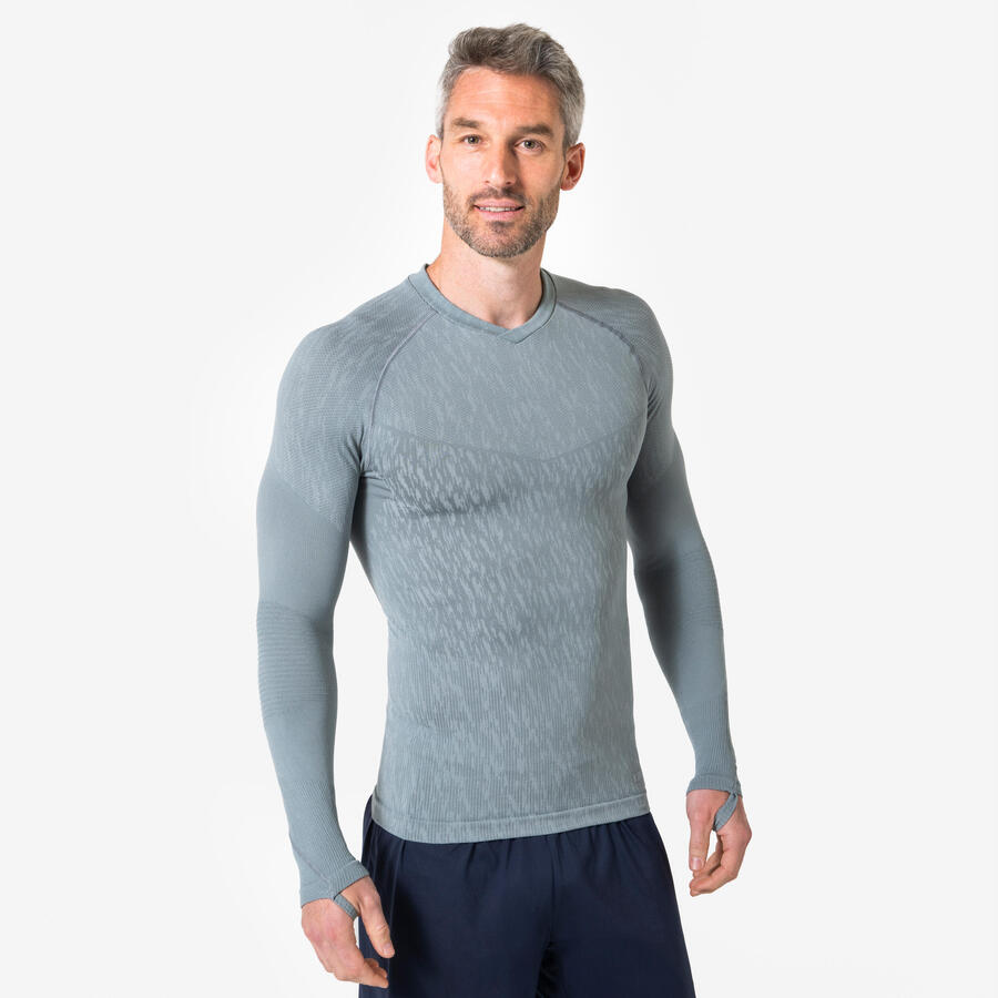 

KIPSTA Женская/мужская бесшовная функциональная рубашка с длинными рукавами — Keepdry серого цвета