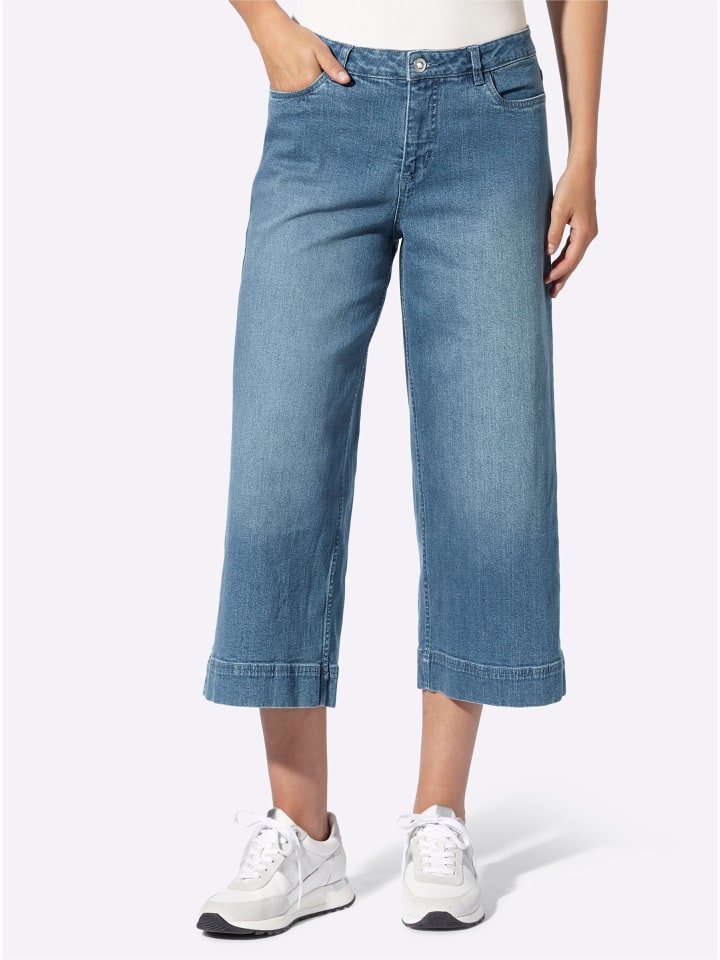 

Джинсы 7/8 синего цвета с отбеленными краями Heine