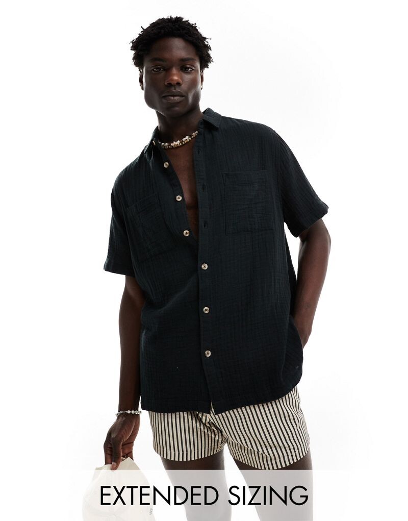 

Черная фактурная рубашка свободного кроя с короткими рукавами и походным воротником ASOS DESIGN