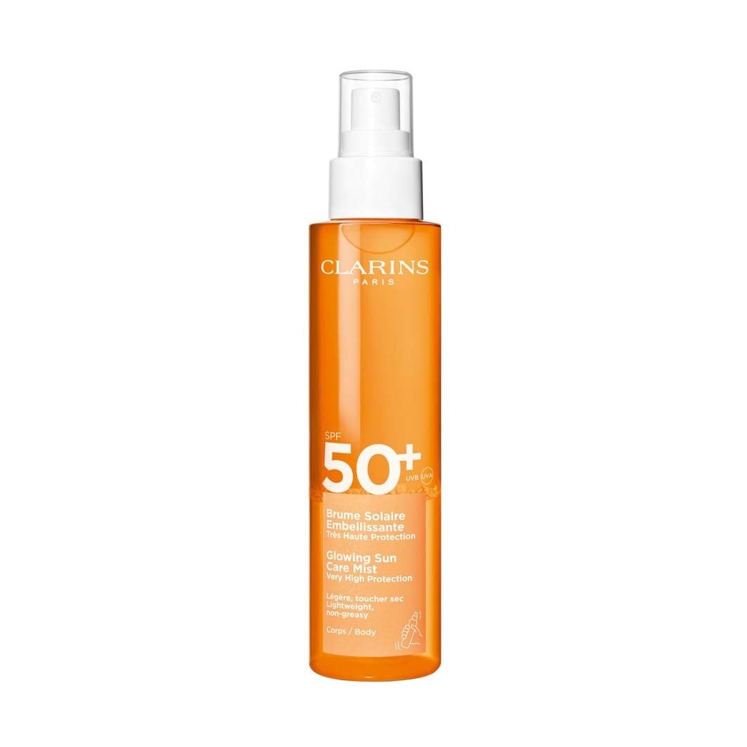 

Солнцезащитный спрей sun care glowing sun care mist spf50+ Clarins, объем 150 мл.