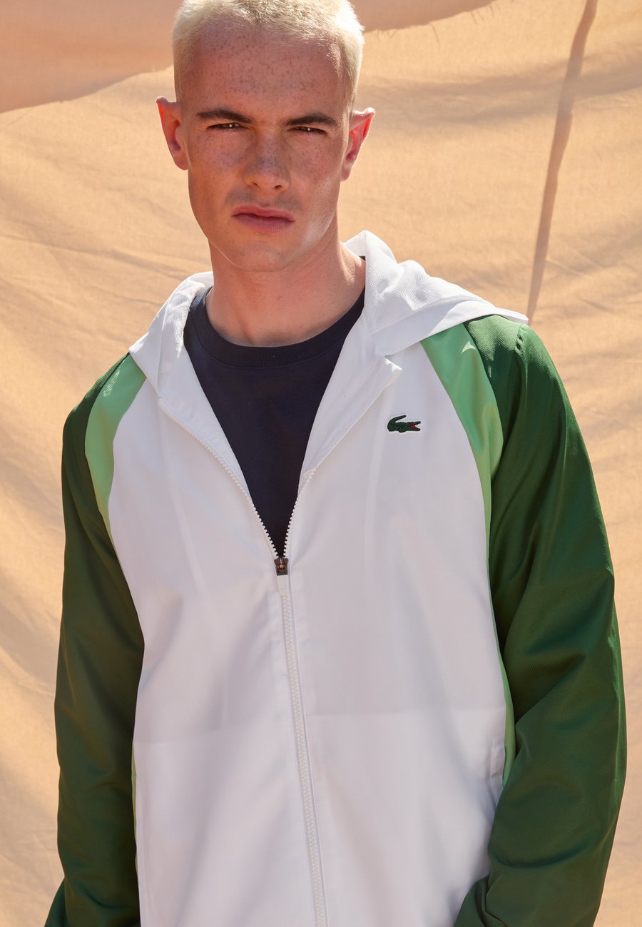 

Спортивный костюм Lacoste Sport TRACKSUIT SET, White/Liamone/Green/White