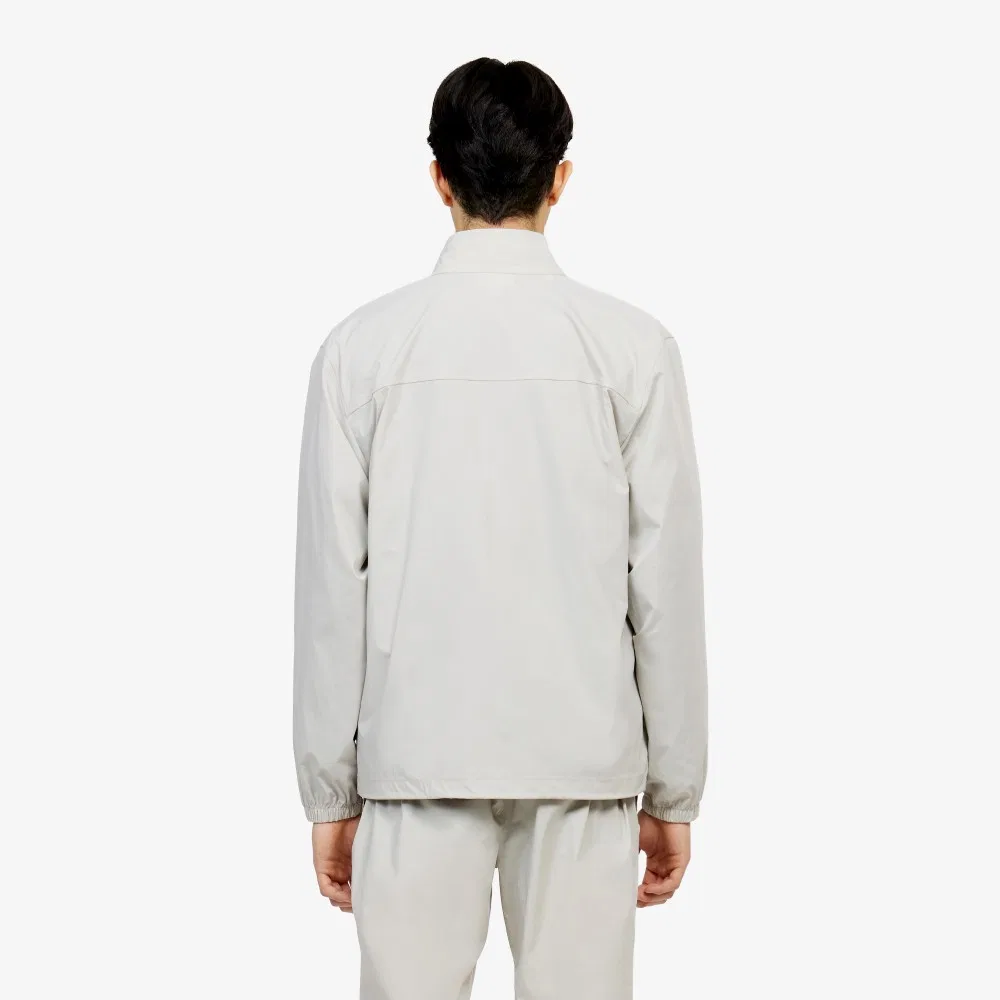 Мужской эластичный тканый пиджак бежевого цвета от Lacoste — фото 3