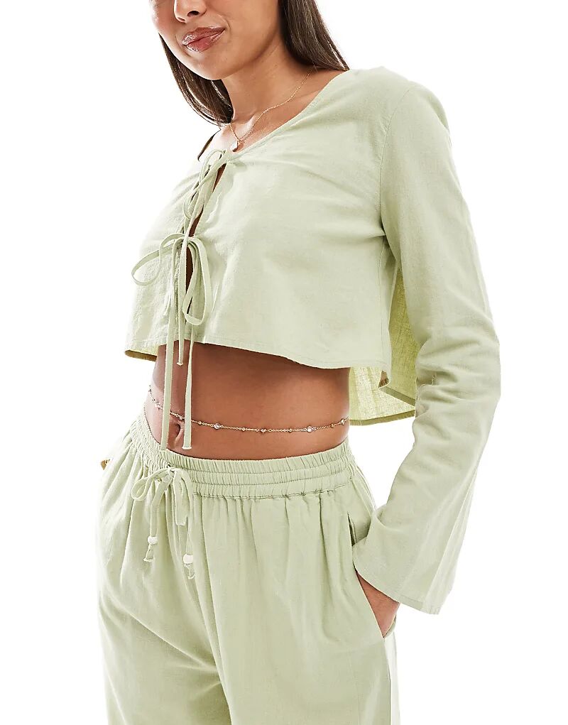 

Пляжный топ Kayla цвета хаки с длинными рукавами и завязкой спереди от ASOS DESIGN