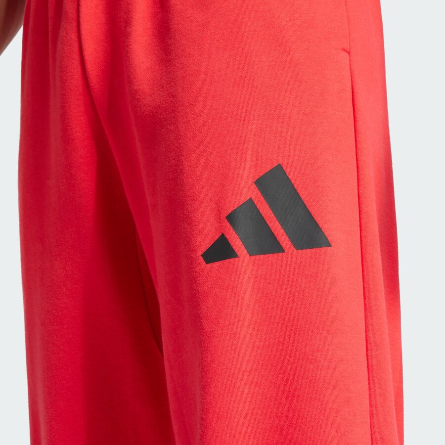 Тренировочные брюки свободного кроя ADIDAS SPORTSWEAR Essentials, красный — фото 3