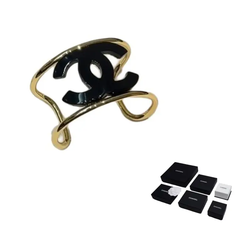 

CHANEL Металлические, Resin браслеты Women's Gold/Black