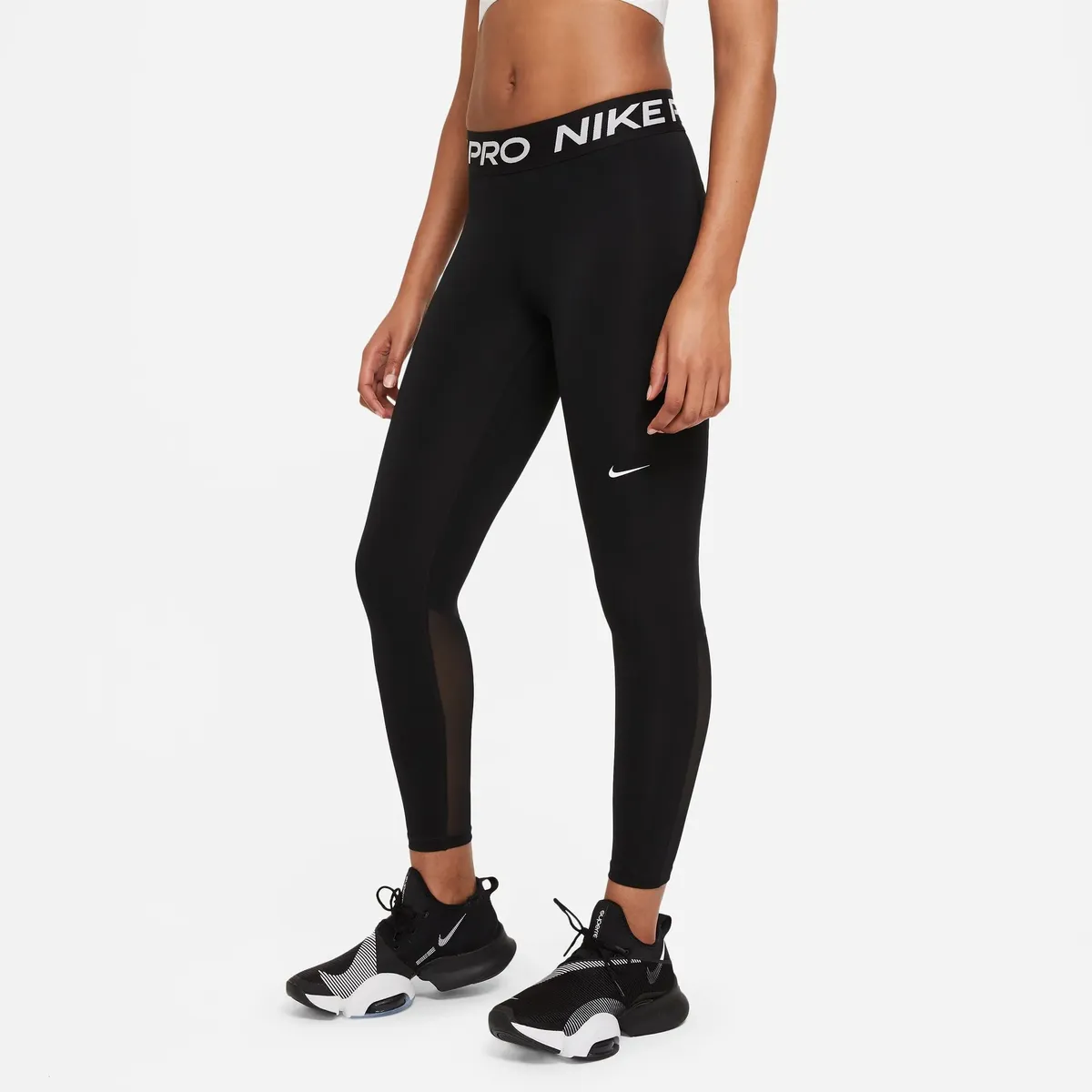

Тренировочные тайтсы Nike "ЖЕНСКИЕ ЛЕГГИНГИ С СЕТОЧНОЙ ПАНЕЛЬЮ ПРО СРЕДНЕЙ ПОСАДКОЙ", черный