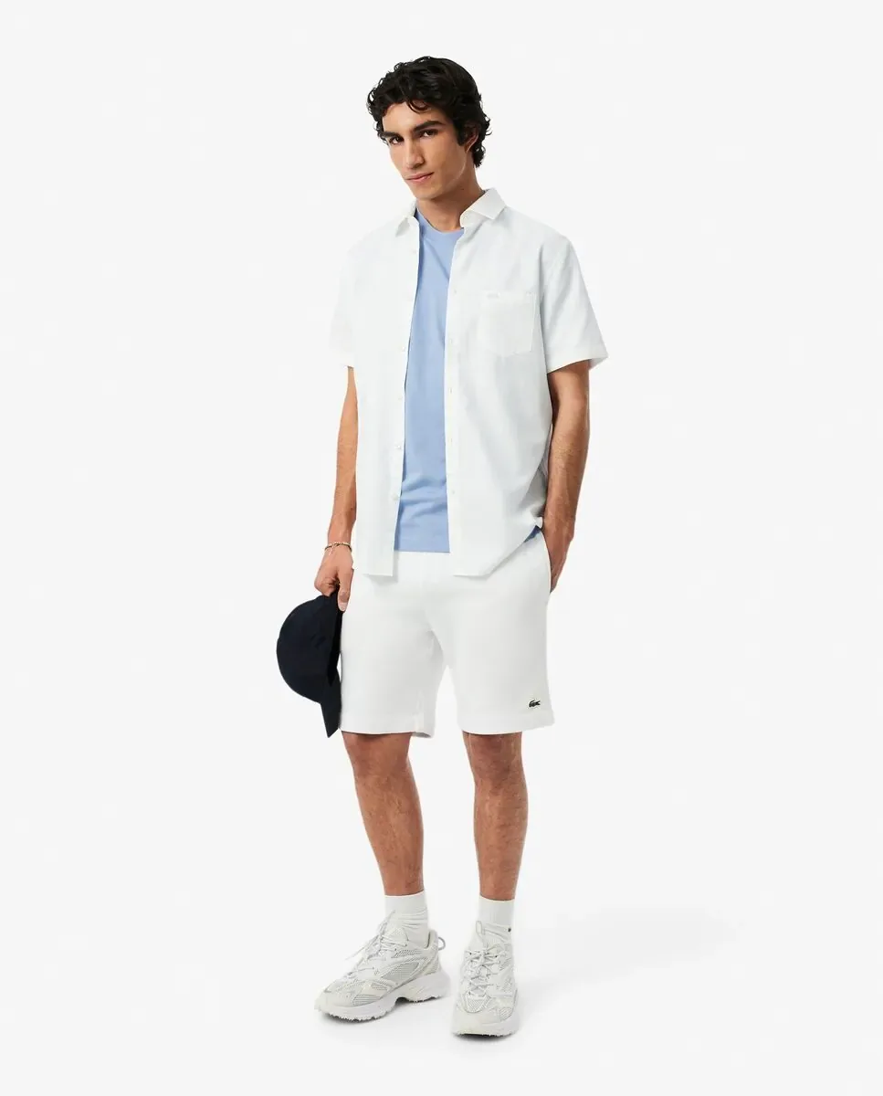 Мужская хлопковая футболка с коротким рукавом и карманом на груди Lacoste, светло-голубой — фото 4