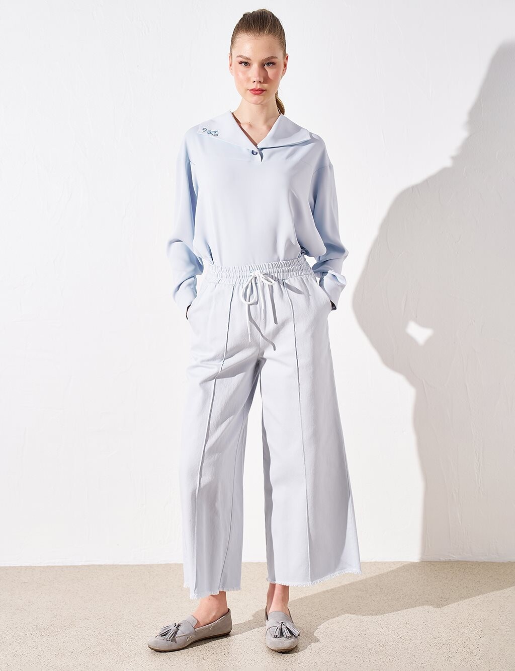 

Широкие джинсовые брюки с кисточками синие Kayra