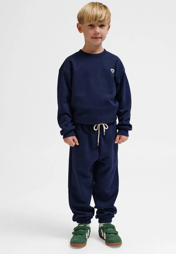 Спортивные штаны hummel hmljr свободного кроя с рисунком пчелы, унисекс. Hummel, Dress Blues — фото 4