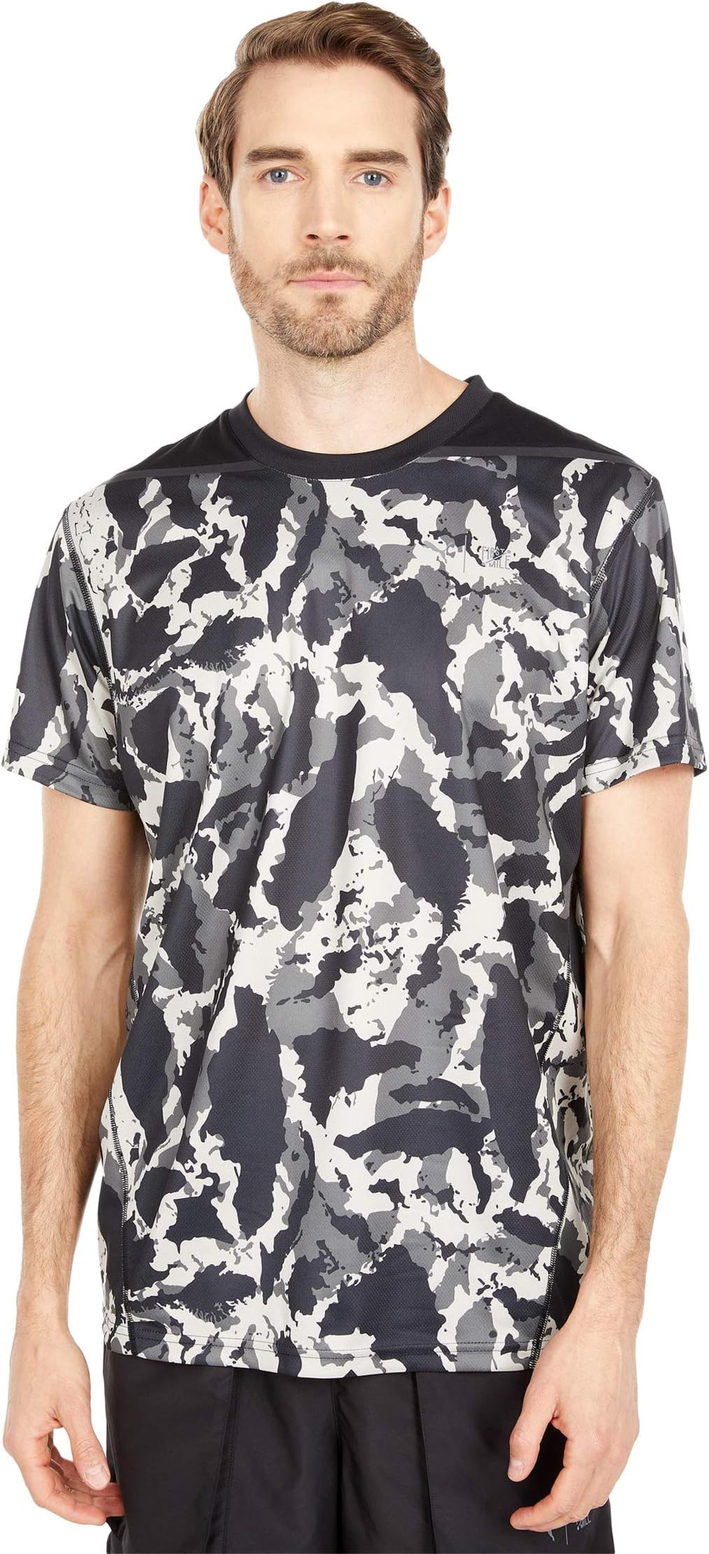 

Футболка PUMA First Mile Camo Tee, цвет Castlerock/Camo Print