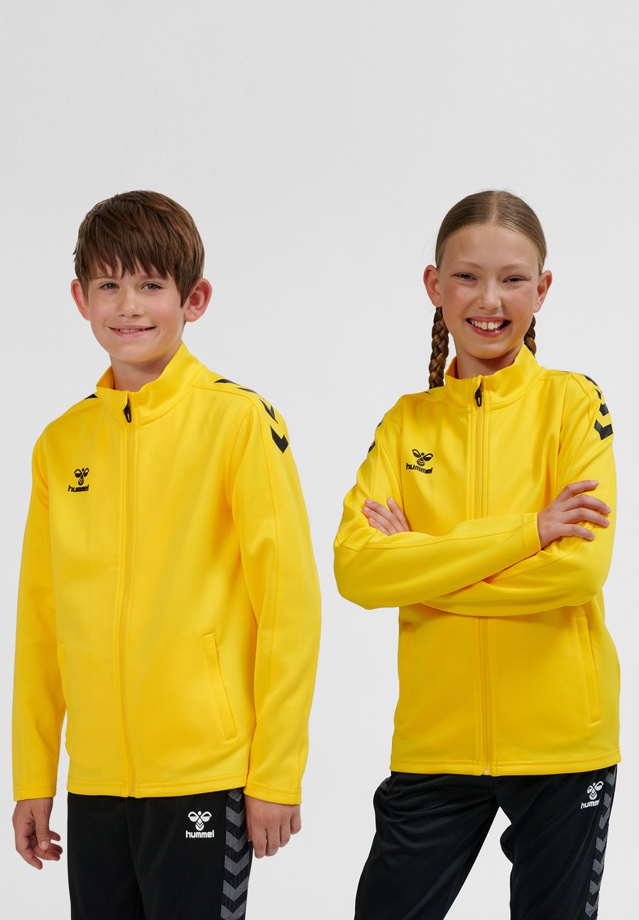 

Толстовка Hummel Zip-up sweatshirt, Sports Yellow/Yellow