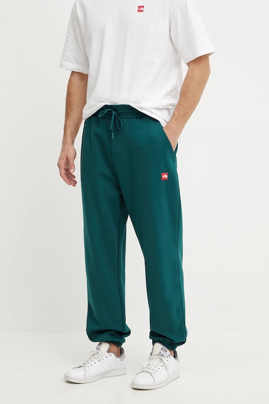 

Хлопковые спортивные брюки Axys The North Face, зеленый