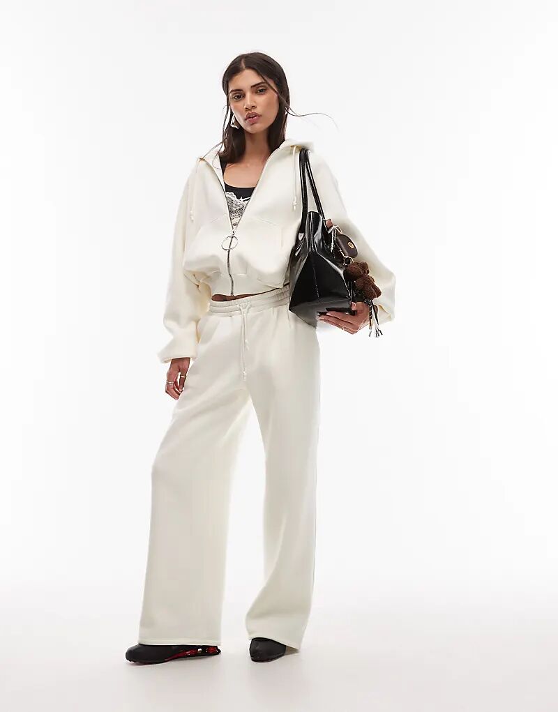 

Спортивные брюки-баллоны ASOS DESIGN с низкой талией кремового цвета