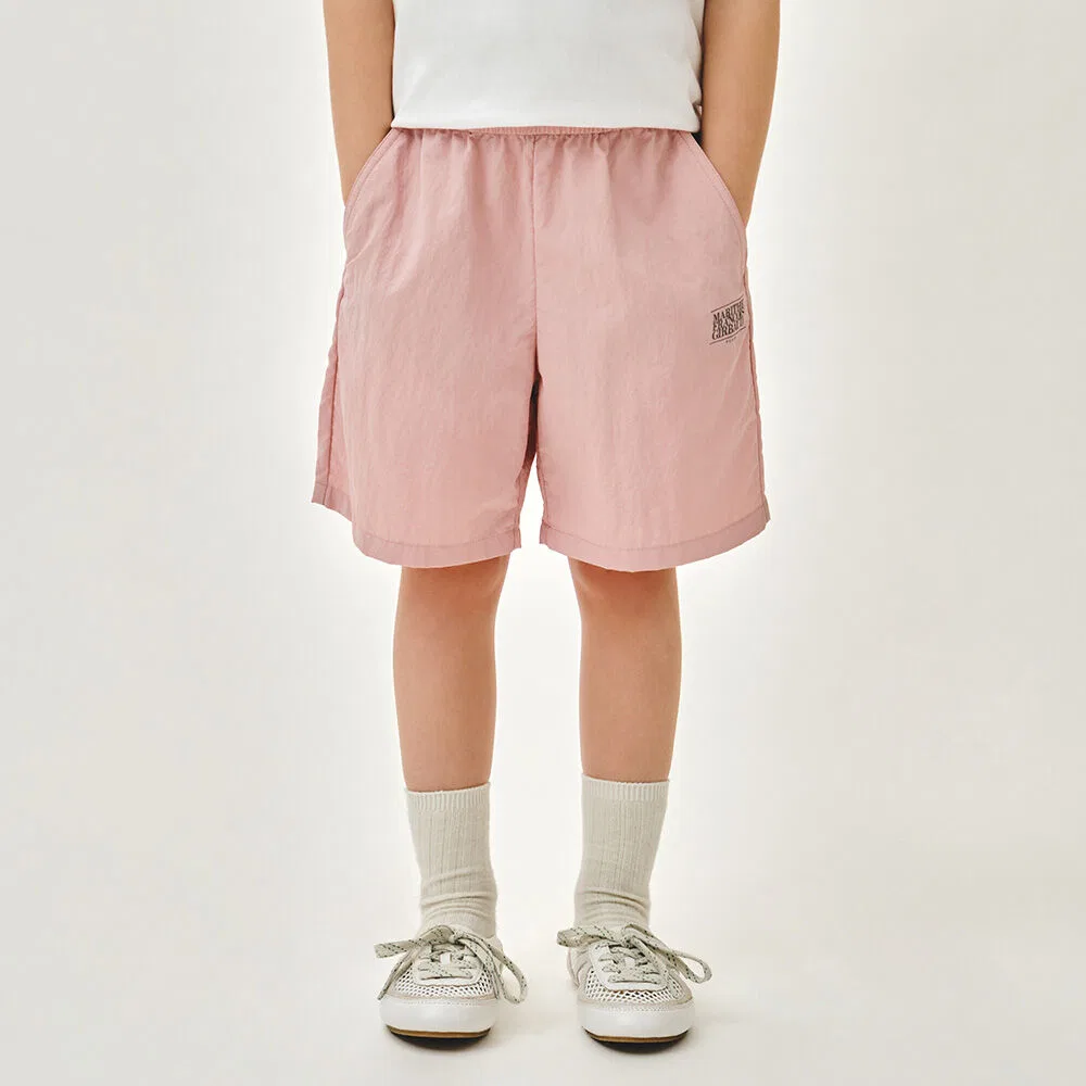Детские розовые шорты с классическим логотипом от Marithé Kids