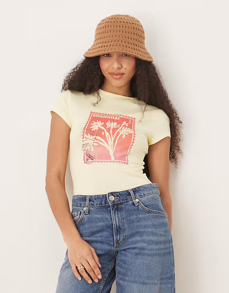 

Детская футболка ASOS DESIGN с цветочным принтом желтого цвета