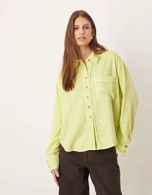 

Желтый льняной топ с ранним блузкой Free People