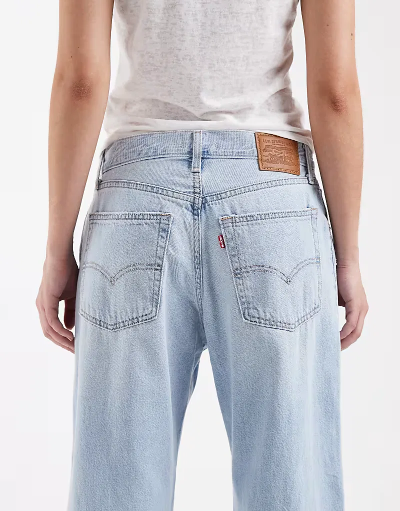 Свободные джинсы-клеш Levis с рваными элементами Levi's, светло-голубой — фото 4