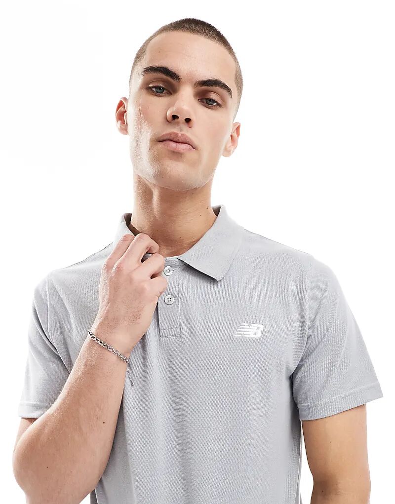 

Поло New Balance Cotton Pique в спортивном сером цвете