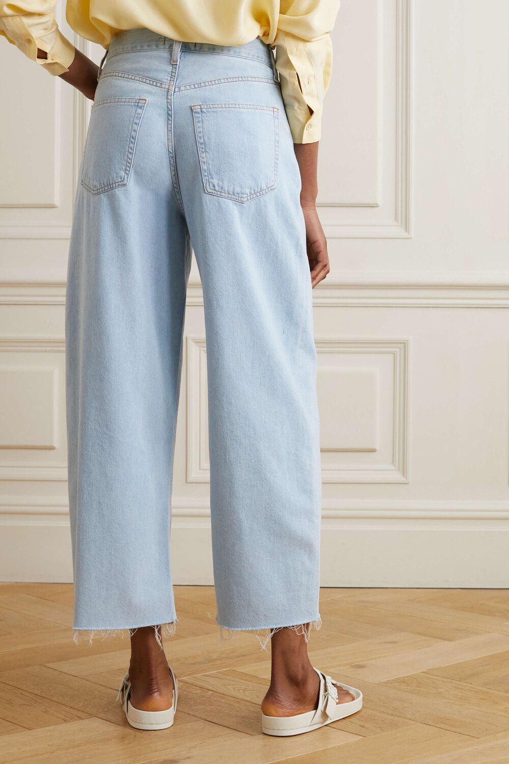 

AGOLDE Укороченные широкие джинсы Dagna с бахромой и завышенной талией из переработанных материалов, деним