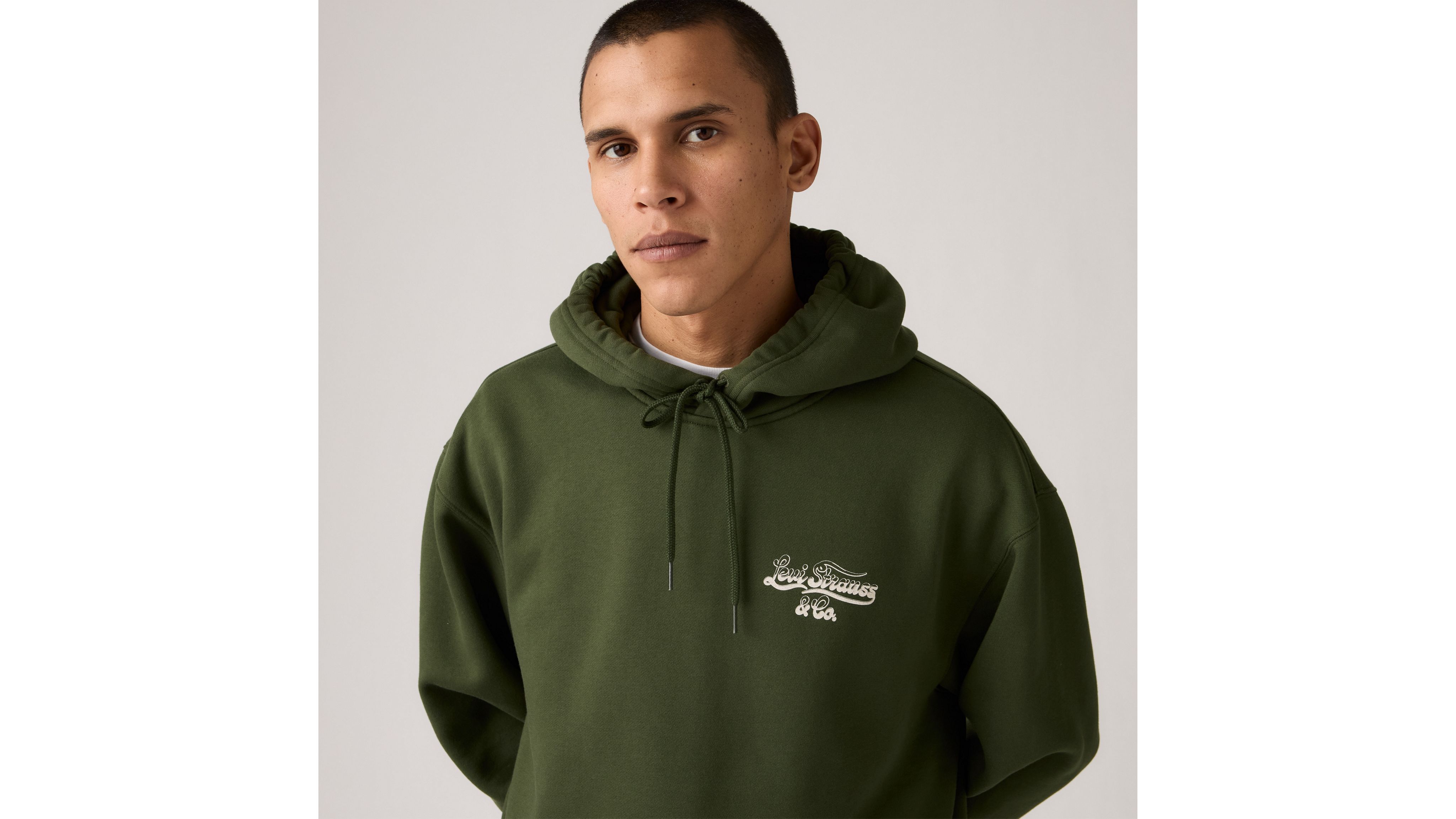 Свободная толстовка с капюшоном и графическим принтом Levi's, Wild West Tour Duffel Bag - Green — фото 4