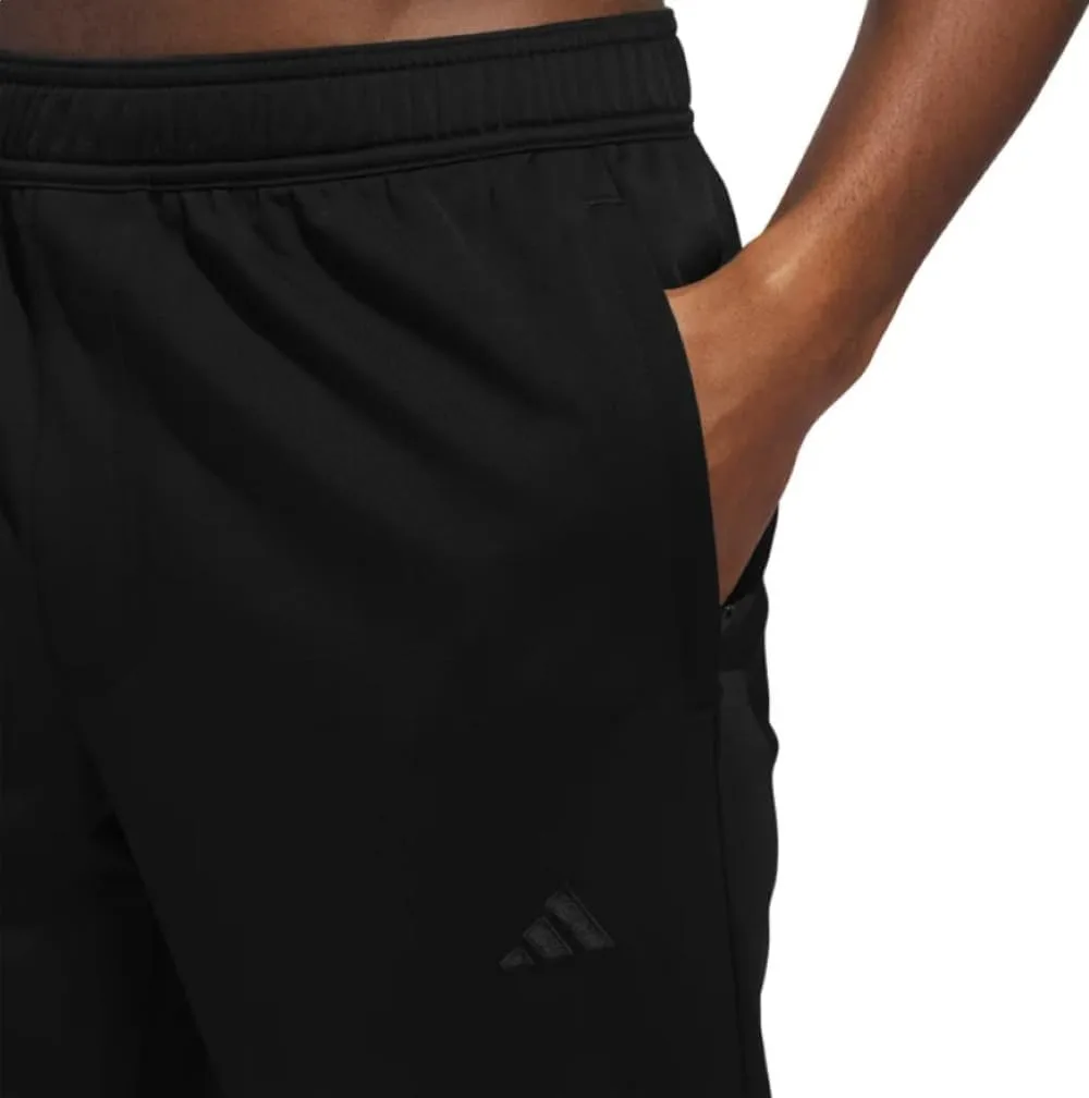 Мужские спортивные брюки Adidas Essential Tricot, черный — фото 4