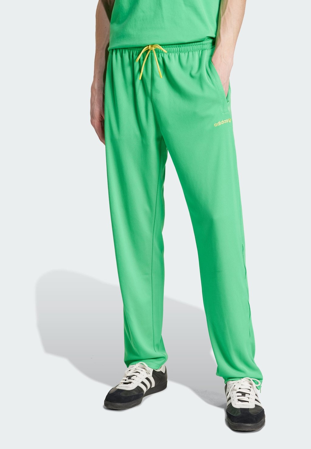 

Спортивные штаны ZIP FLARE Adidas Originals, зеленый