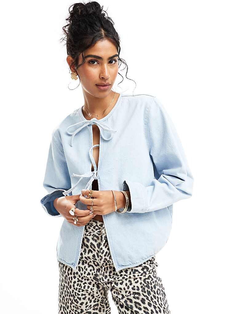 

ASOS DESIGN – синий джинсовый топ с завязками спереди, длинными рукавами и эффектом отбеливания