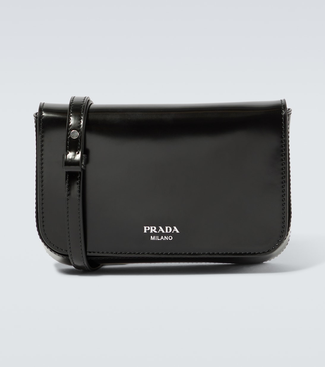 

Миниатюрная кожаная сумка через плечо Prada, черный