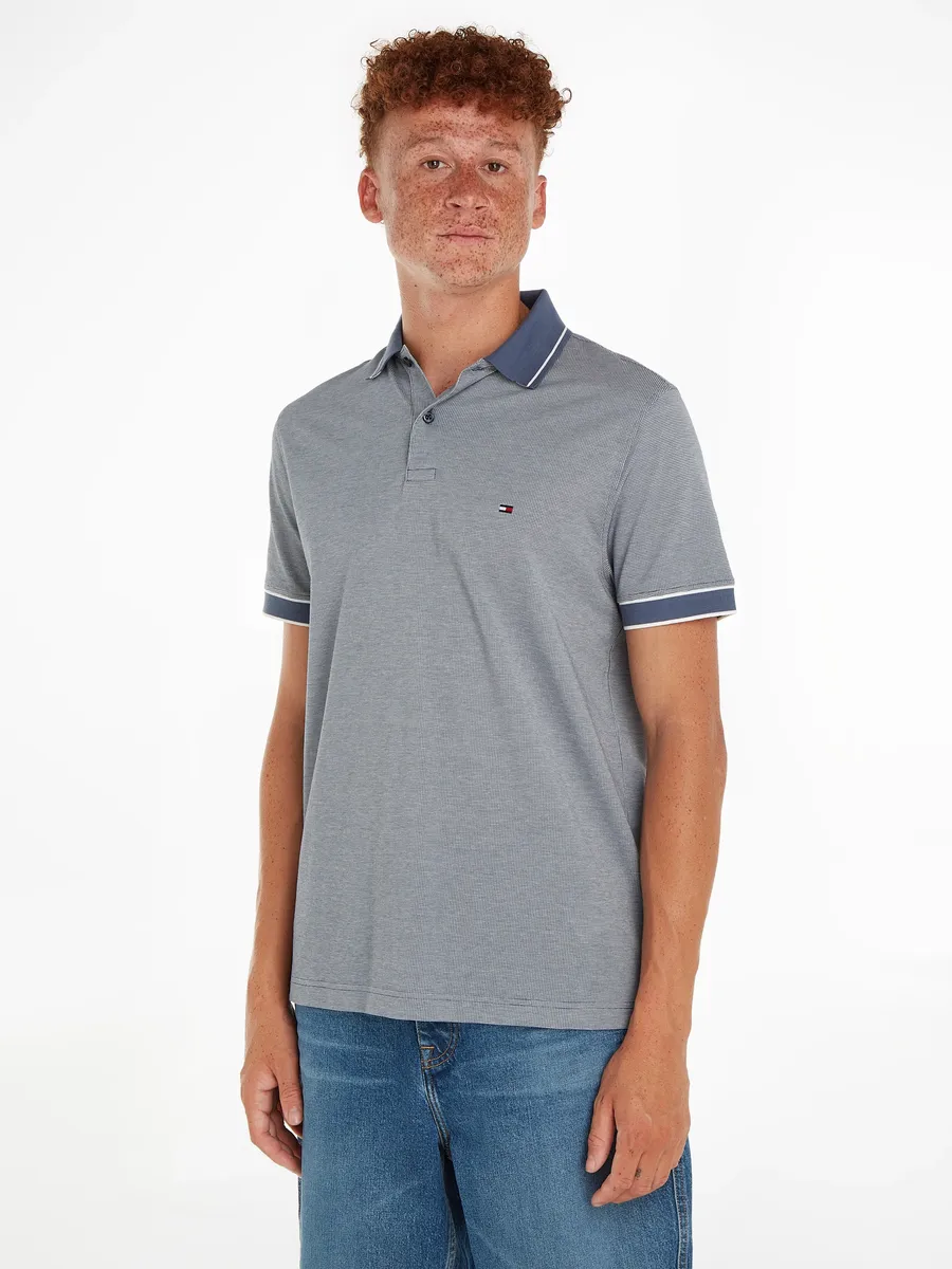 

Рубашка-поло Tommy Hilfiger "MONOTYPE OXFORD COLLAR REG POLO", цвет Faded Indigo / Ecru