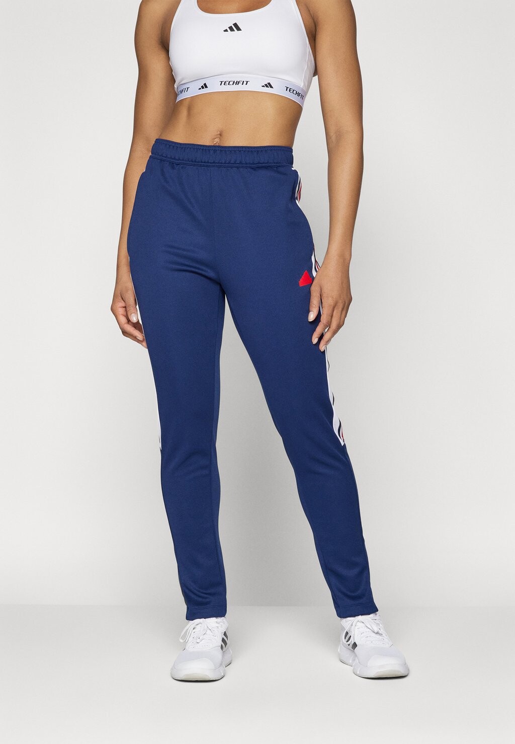 

Низ спортивного костюма adidas Sportswear, синий Tiro Cut Stripes Trackpants