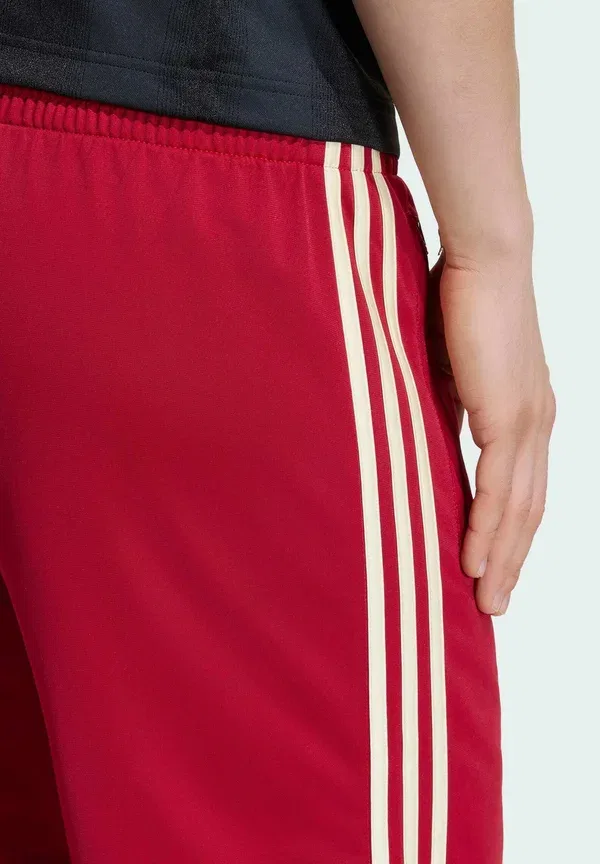 Спортивные штаны Firebird tp tracksuit bottoms Adidas Originals, командно-красный/теплый ванильный — фото 4