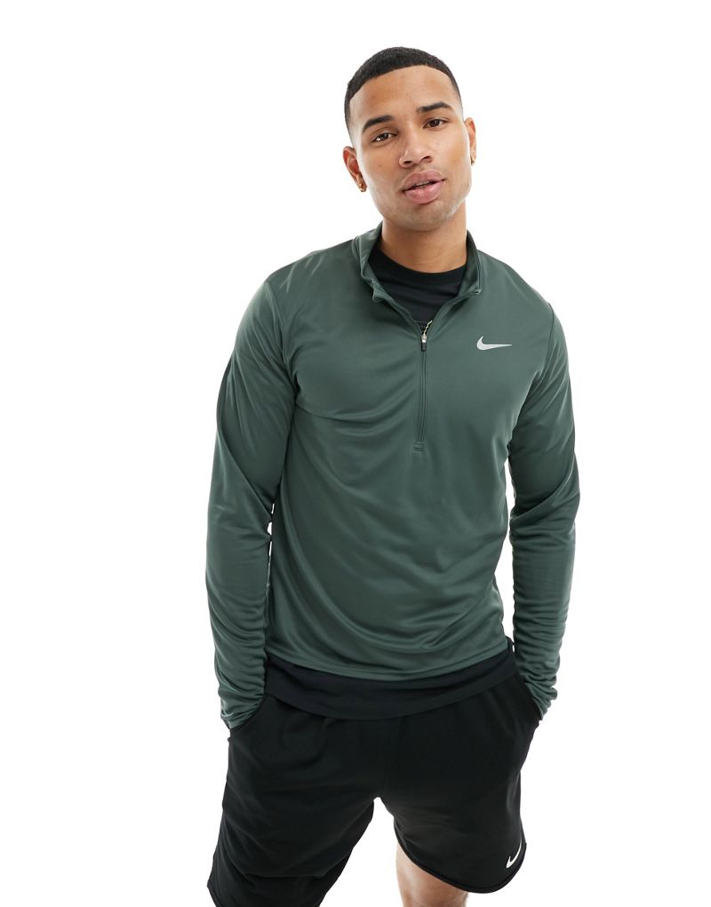 

Зеленый топ Nike Dri-FIT Pacer Vintage с короткой молнией и длинными рукавами