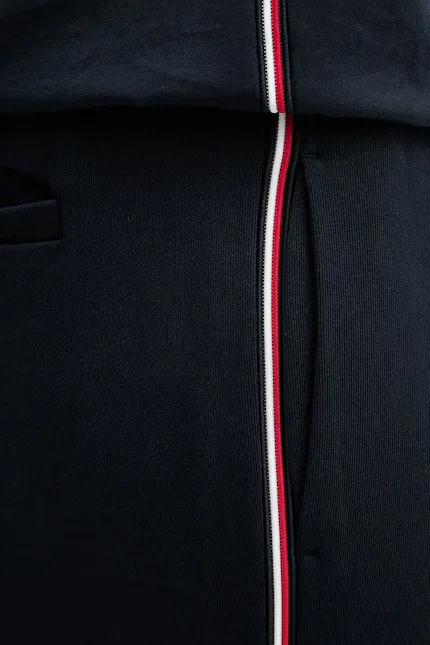 Спортивные штаны из хлопка модель с зауженными штанинами Tommy Hilfiger, синий — фото 4