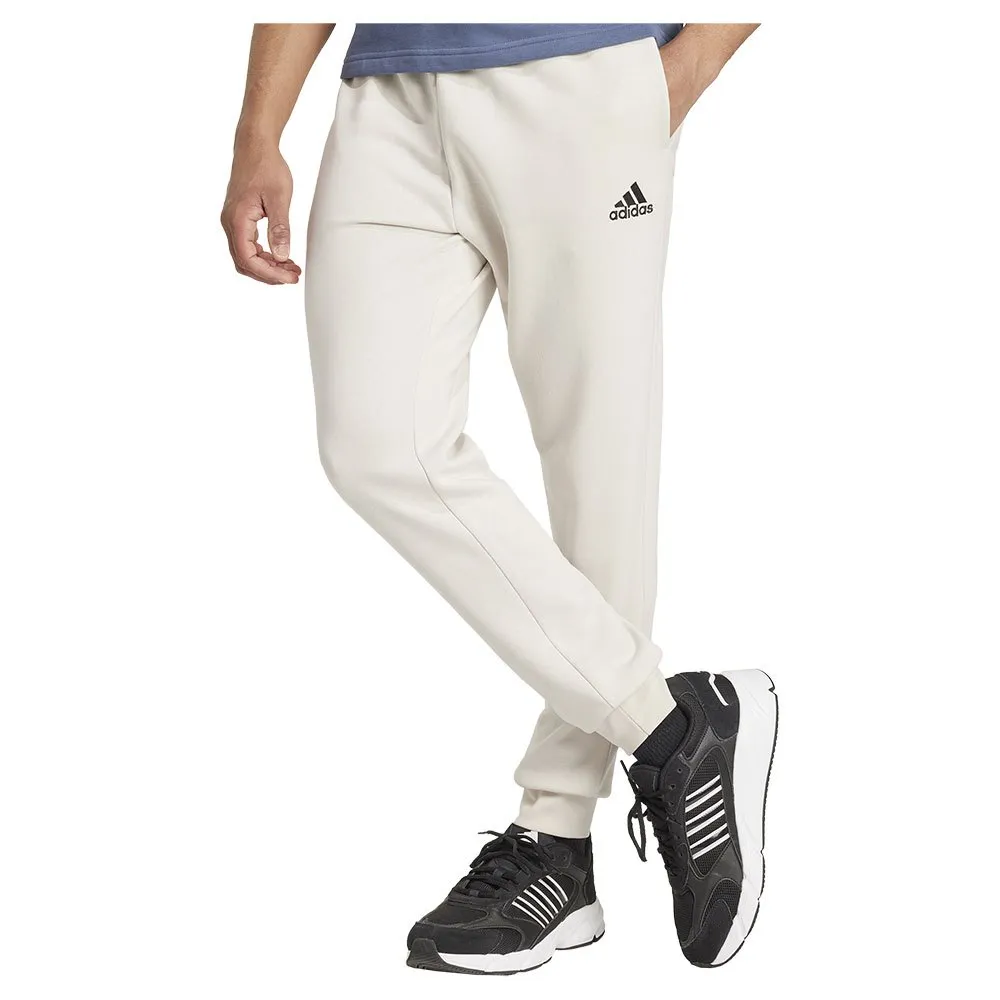 

Джоггеры adidas Essentials Fleece Regular Tapered, белый