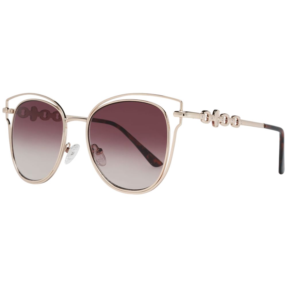 

Золотые женские солнцезащитные очки GUESS
