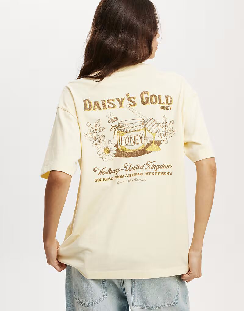 

Топ Cotton:On The boxy graphic tee in yellow