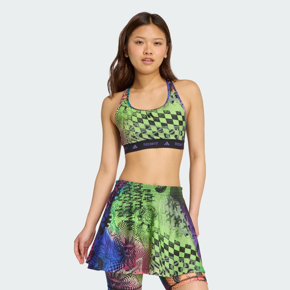 

Спортивный бюстгальтер Adidas x Jeremy Scott Bra, цвет Acid Yellow/Semi Lucid Fuchsia/Active Purple