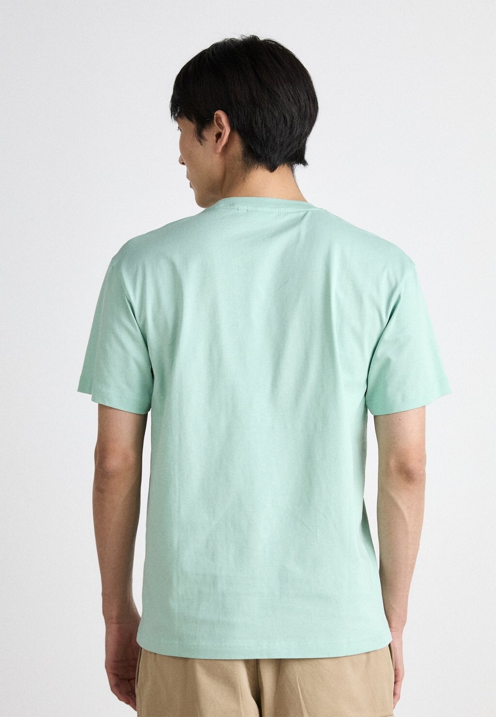 

Базовая футболка Hero Logo Comfort Calvin Klein, светло-зеленый