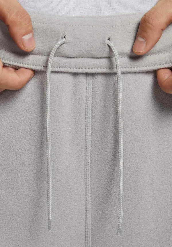 Брюки от спортивного костюма wolf tree pant Nike Acg, College Grey/Photon Dust/Grey Fog/(Summit White) — фото 4