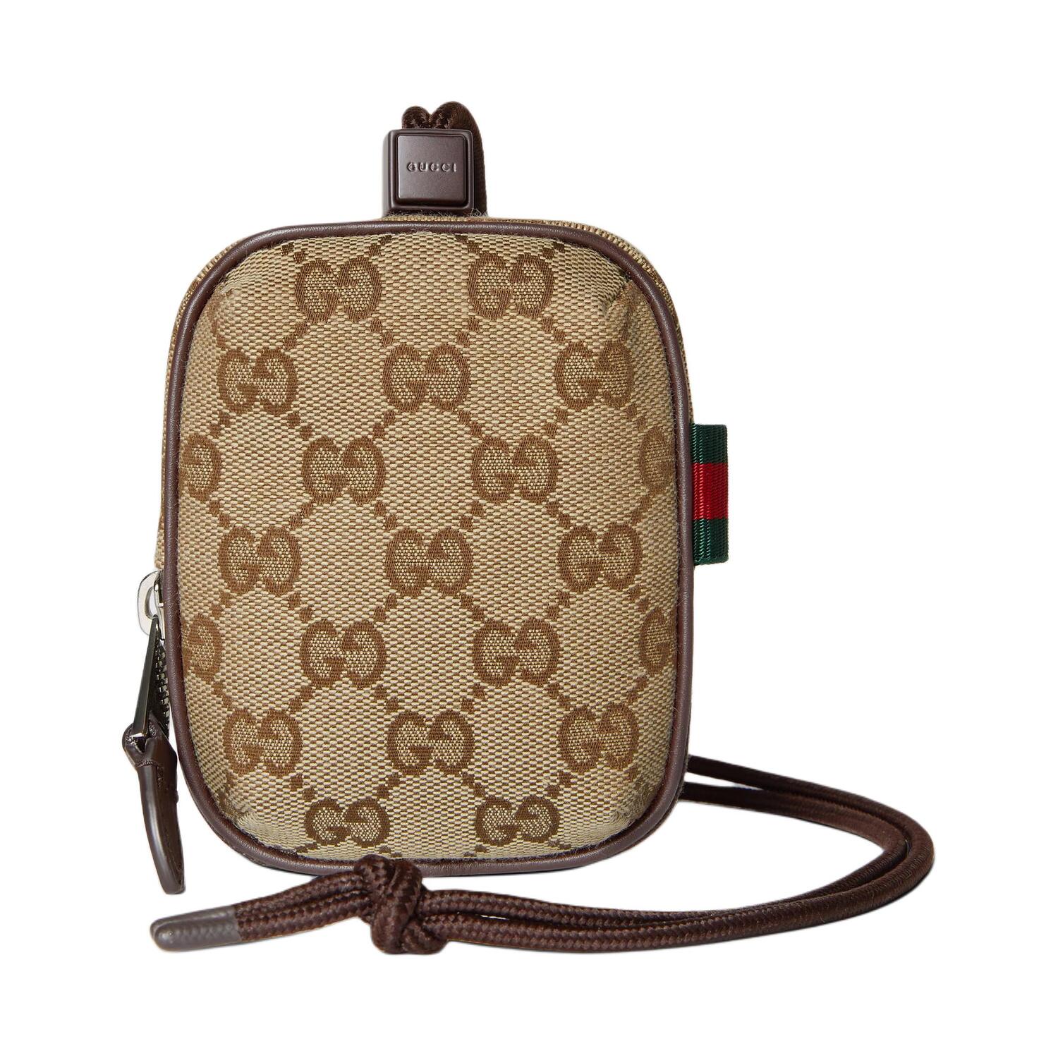 

Gucci Миниатюрный мужской кошелек для монет GG Canvas, коричневый