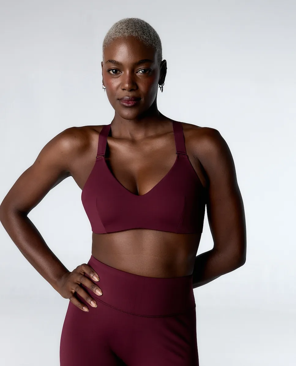 

Спортивный бюстгальтер средней поддержки с перекрещенными бретелями Black Limba, фиолетовый