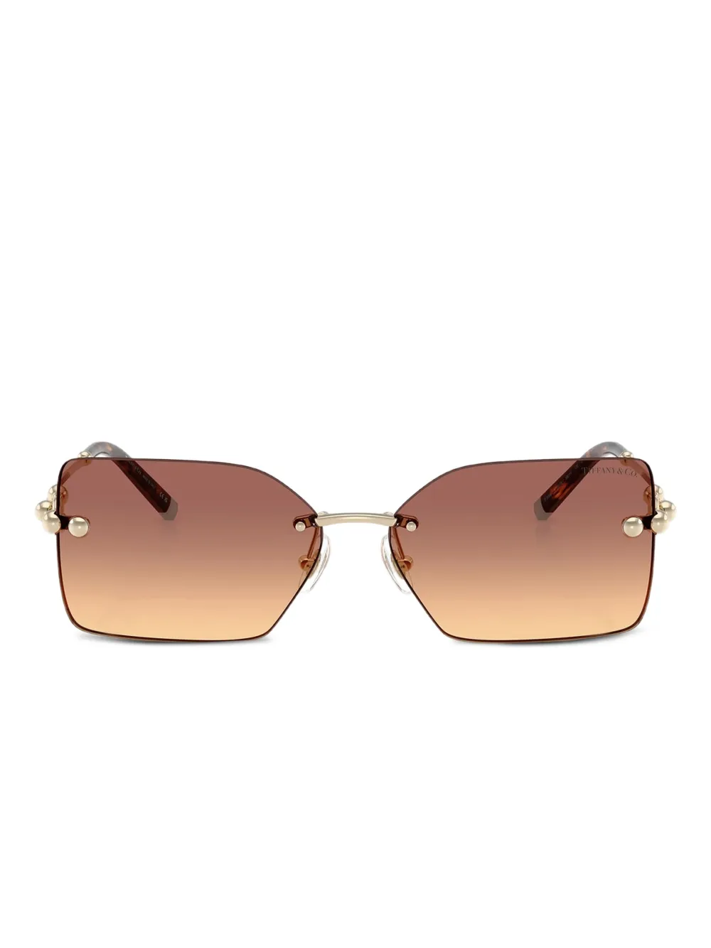 

Солнцезащитные очки в безободковой оправе Tiffany & Co, золотистый