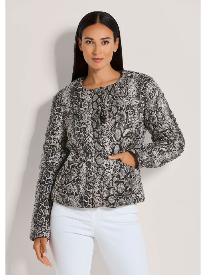 

MADELEINE Стеганая куртка с уникальным принтом в цвете капучино / черный / многоцветный