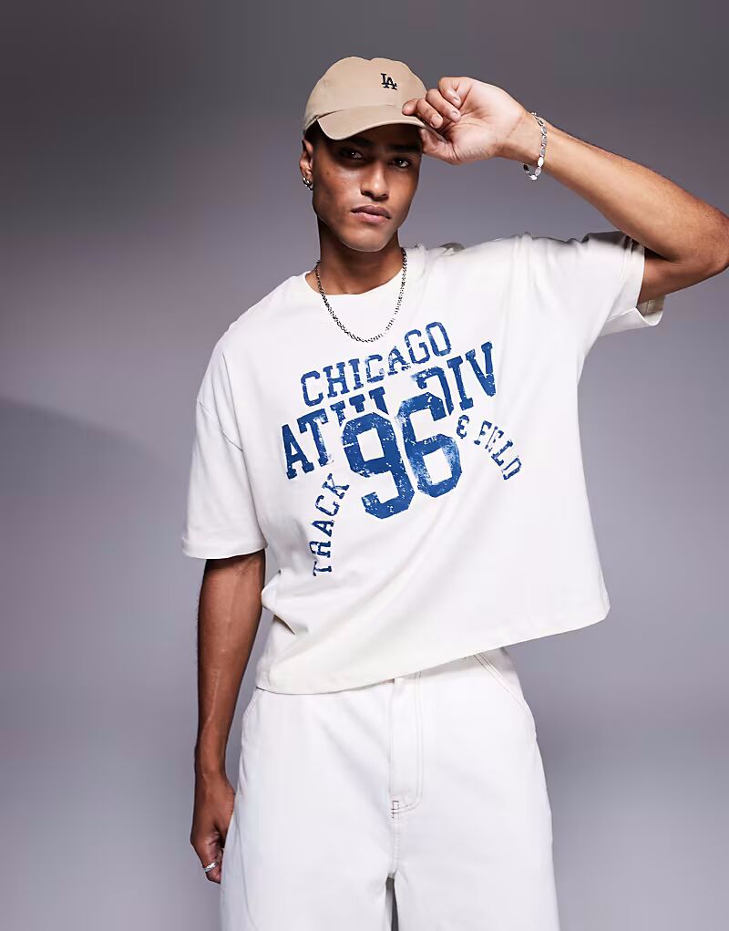 

Футболка свободного кроя ASOS DESIGN свободного кроя со спортивной графикой кремового цвета