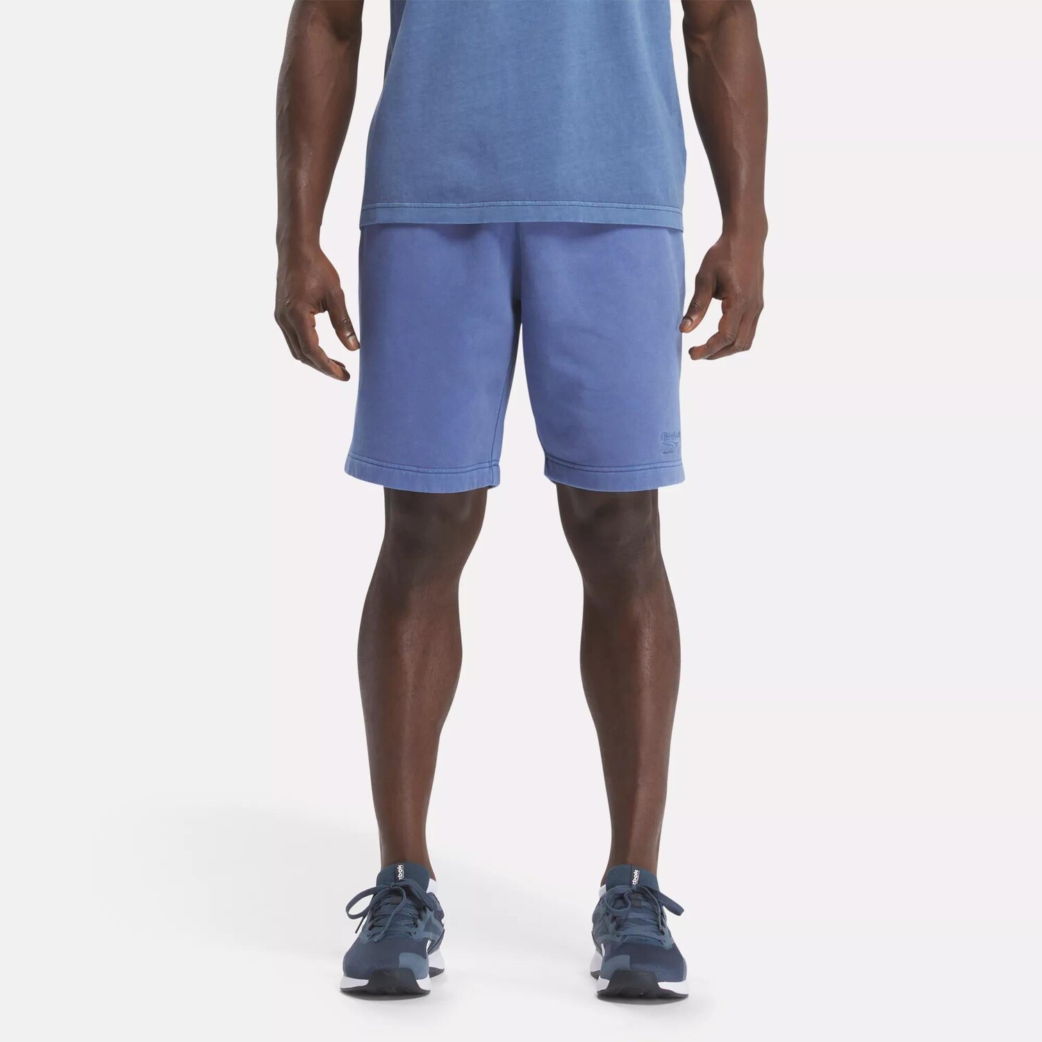 

Потертые шорты Reebok Identity, цвет Uniform Blue